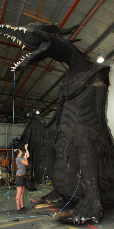 Dragon stage prop under construction in a workshop for Rock2Wgtn.